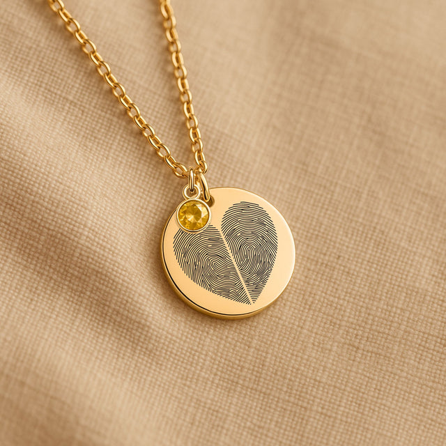 Fingerprint necklace with a heart engraving and a birthstone